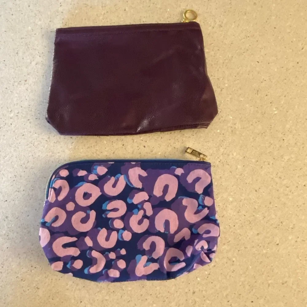 Two Estée Lauder NWOT make up bags